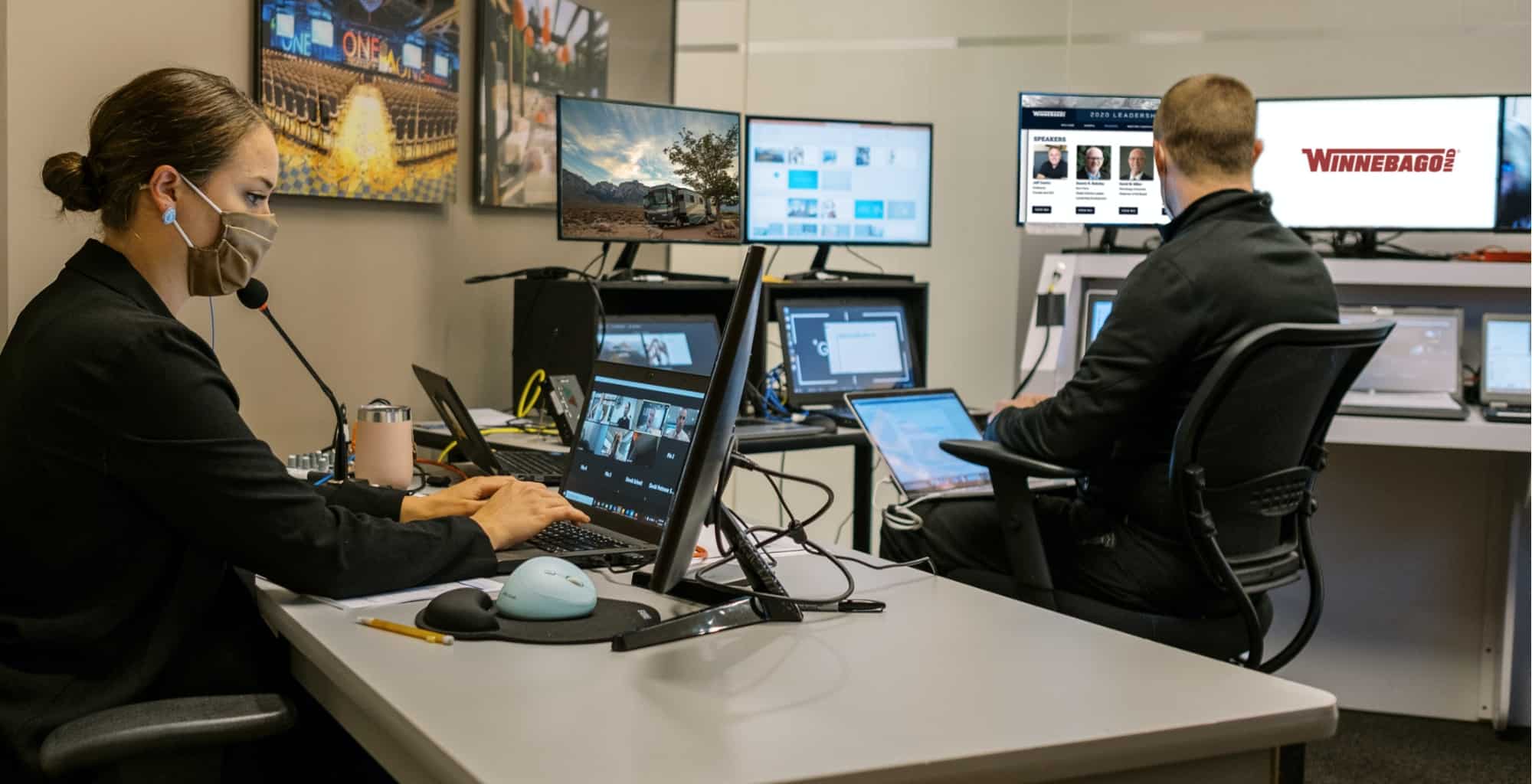 A staff member is prepping speakers to go live in a zoom meeting