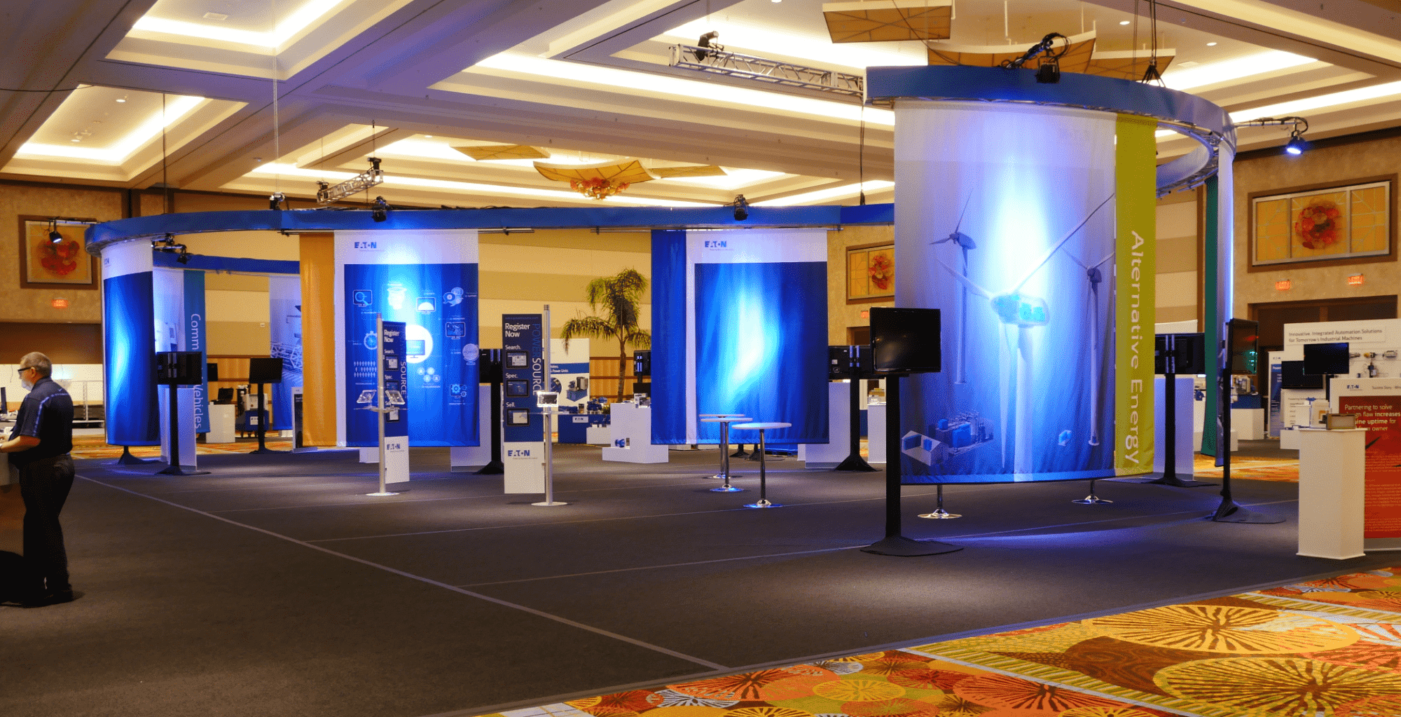 Company display their products inside of an exhibit hall