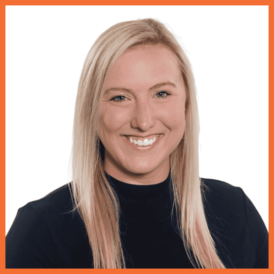 Head-and-shoulders portrait of a smiling blonde woman in a black top against a white background with an orange border, facing the camera.
